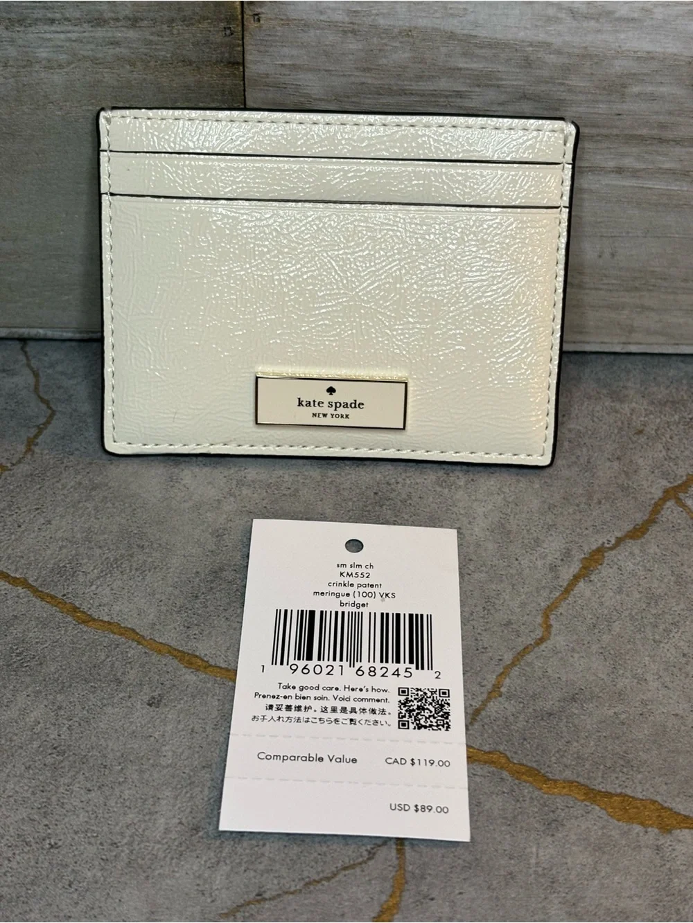kate spade NWT Cream Leather Card Holder with Gold Plaque
